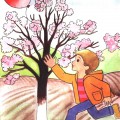 Мальчик запускает воздушный шарик у цветущей яблони - картинка №10378